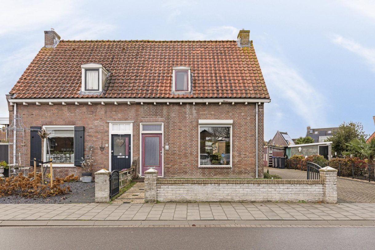 Te koop: Foto Woonhuis aan de Sluisweg 7 in Lopikerkapel