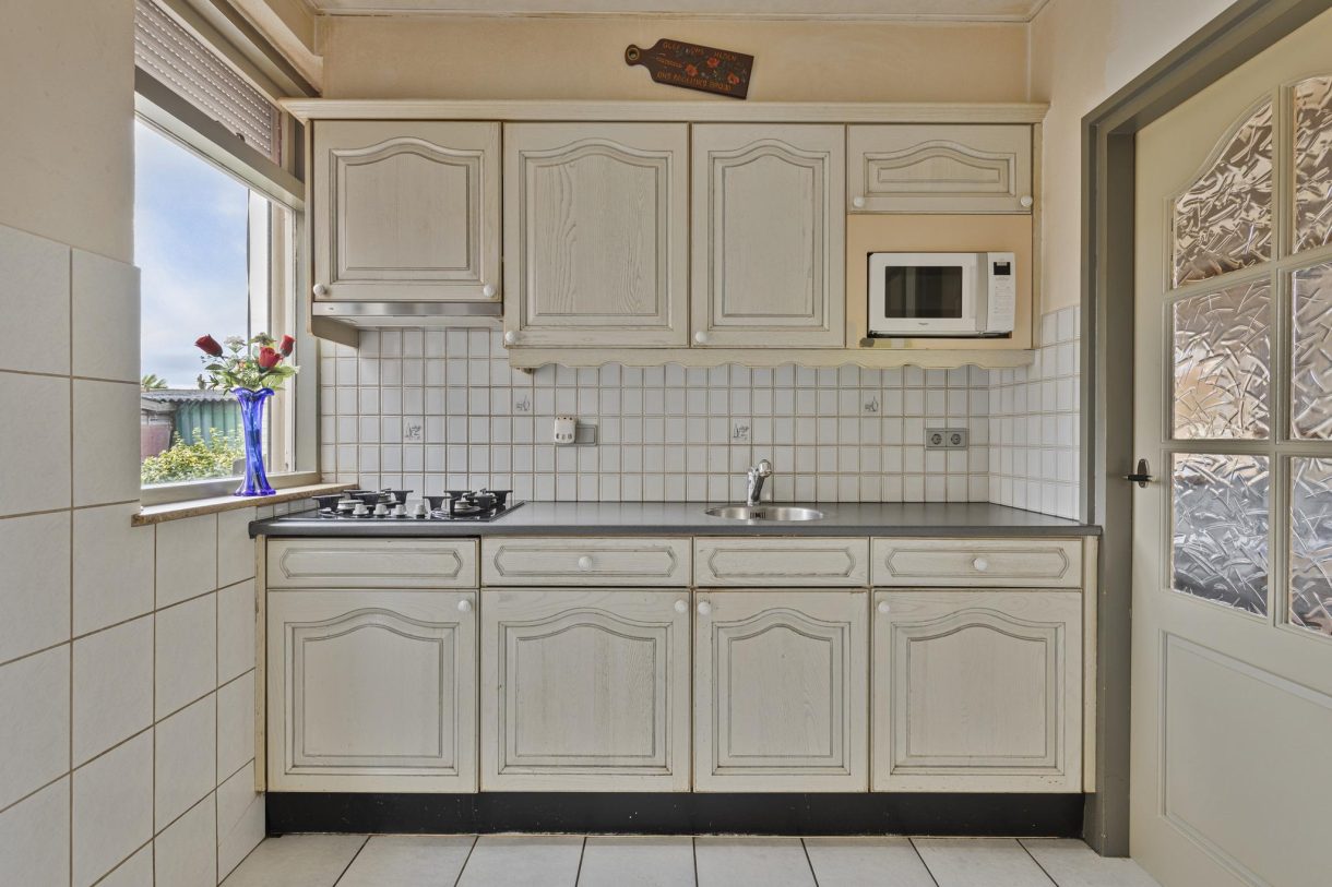 Te koop: Foto Woonhuis aan de Sluisweg 7 in Lopikerkapel