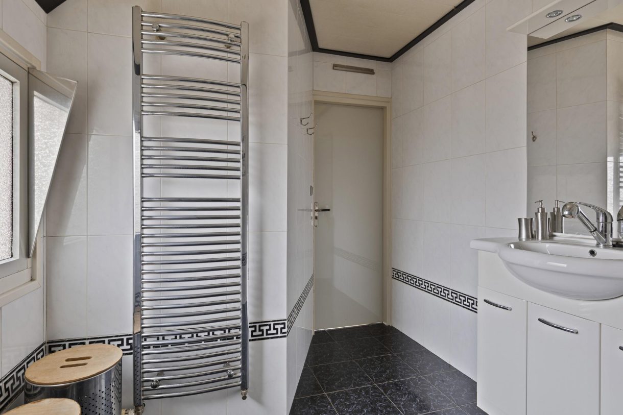 Te koop: Foto Woonhuis aan de Sluisweg 7 in Lopikerkapel